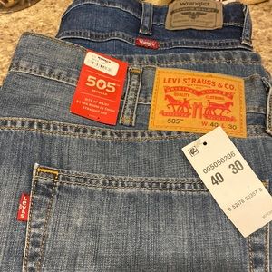 Lot of 2 pair jeans. One wrangler slim straight and one Levi’s straight 505